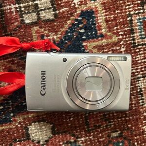 Canon Silver Digital Camera with Red Accents